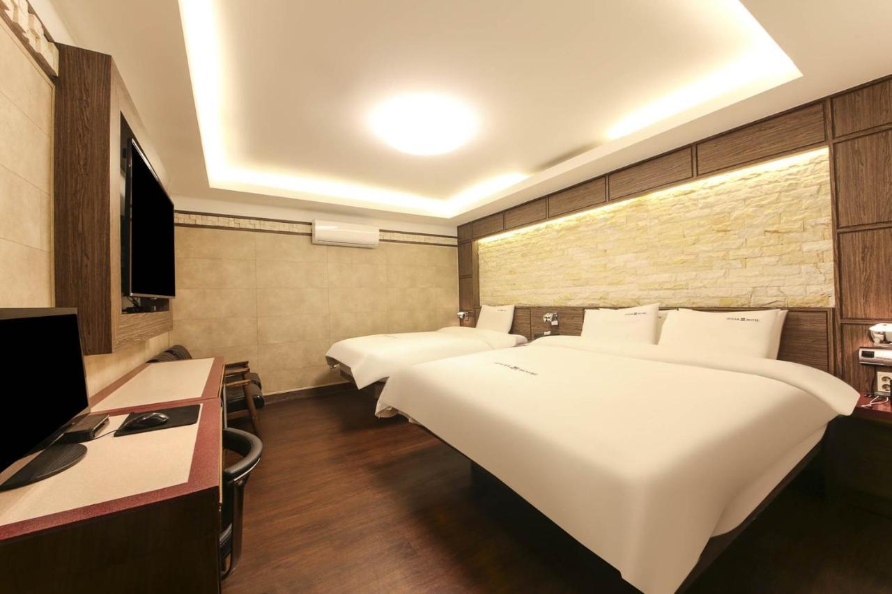 Sugar Hotel Kjongdzsu Kültér fotó